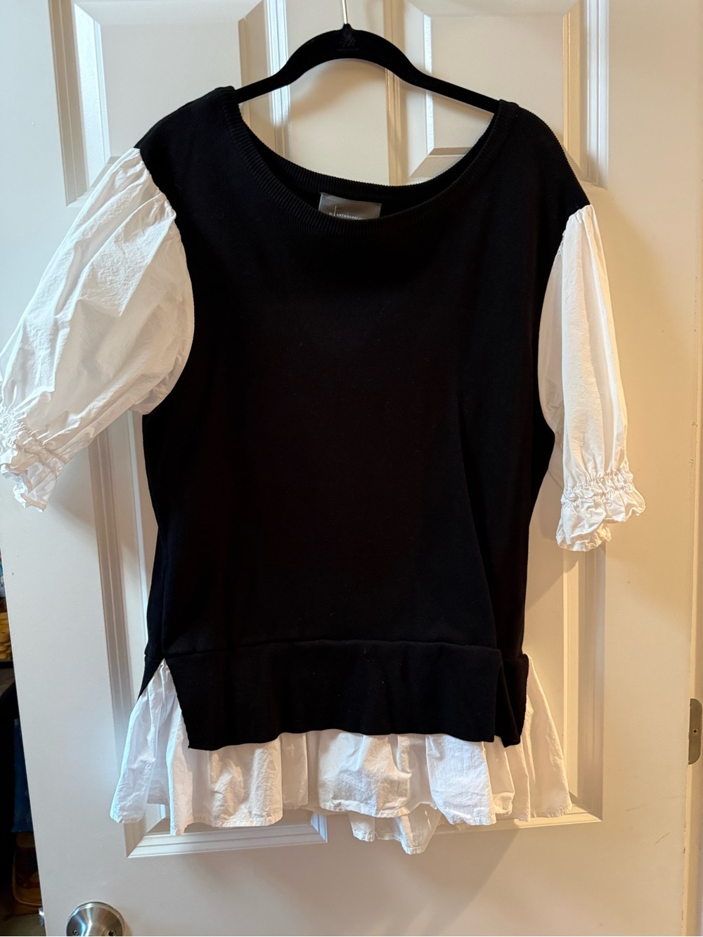 Anthropologie Black Pullover with White Puff Sleeves and Ruffled Hem